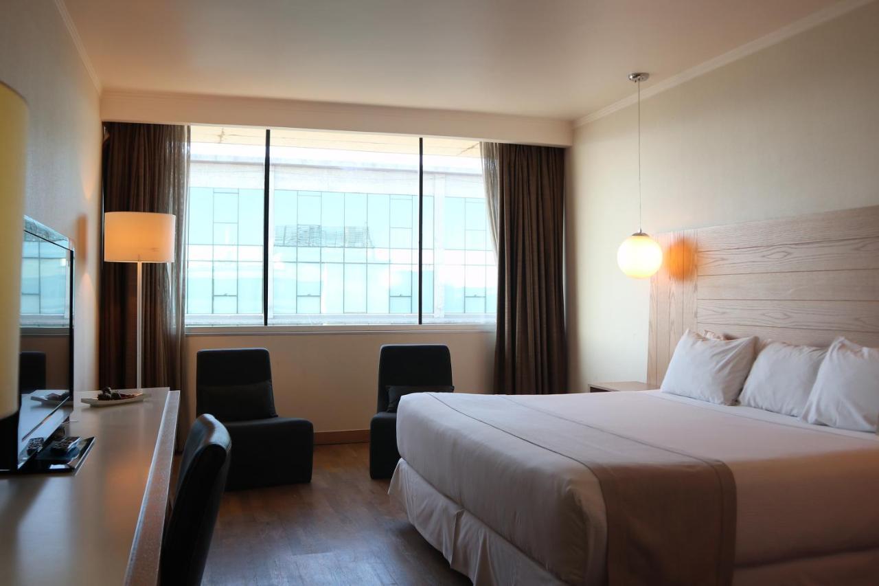 Wyndham Concepcion Pettra Otel Dış mekan fotoğraf A room at the hotel